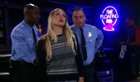 Kiki is arrested at the Floating Rib