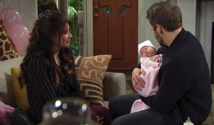 Steffy looks on as Liam holds Phoebeth