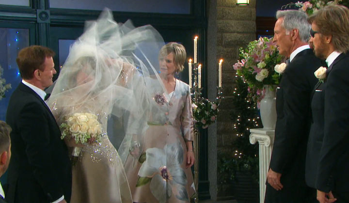 Marlena struggles with her veil as she prepares to leave John for Roman -- er, John