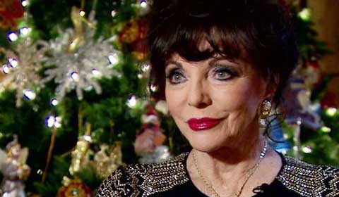 Joan Collins is quite a dame -- literally