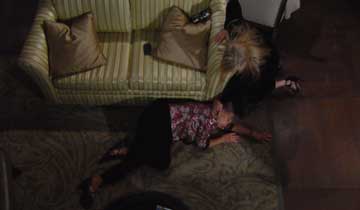 Ashley discovers an unconscious Dina
